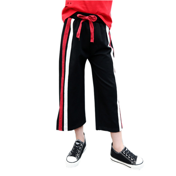 Pantaloni copii moderni pentru fete in stil liber cu talie inalta, cu fanta si margini colorate, doua modele