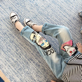 Blugi de copii actuali pentru fete cu aplicatii colorate in culoare deschisa