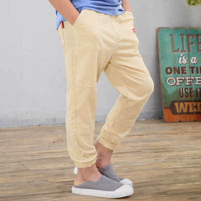 Pantaloni eleganti pentru copii in trei culori cu buzunare si imprimeu