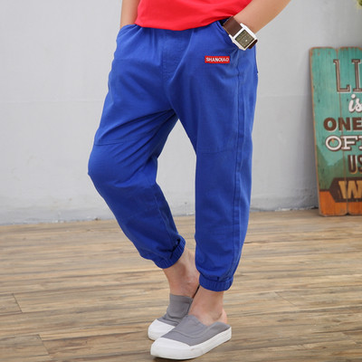 Pantaloni eleganti pentru copii in trei culori cu buzunare si imprimeu