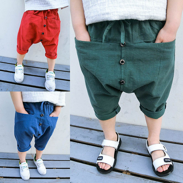 Pantaloni moderni pentru copii cu buzunar frontal nestandard și nasturi de decor