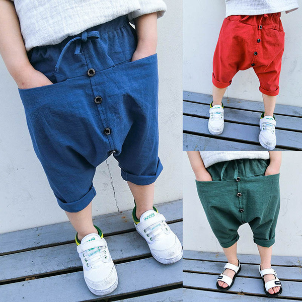 Pantaloni moderni pentru copii cu buzunar frontal nestandard și nasturi de decor