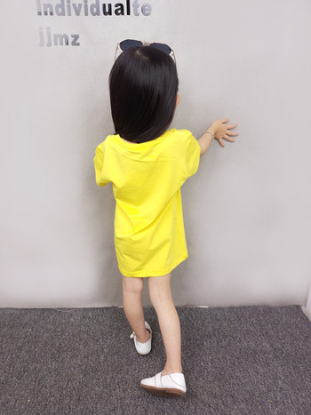 Παιδικό t-shirt για κορίτσια με εφαρμογή και επιγραφή σε κίτρινο και λευκό χρώμα
