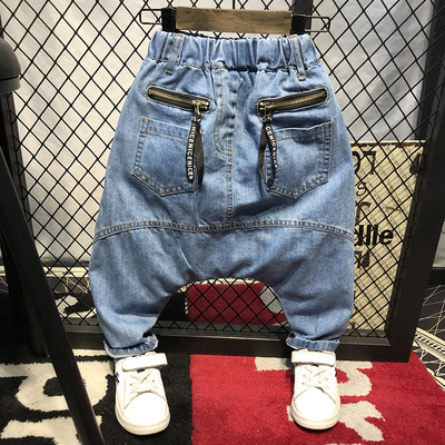 Children`s sports jeans for boys potur type with deep pockets in light color