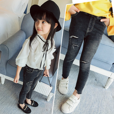 Стилни детски дънки за момичета с висока талия с кръпки в черен цвят