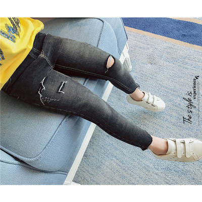 Stílusos gyermekfarmer lányoknak, magas derékkal, fekete foltokkal