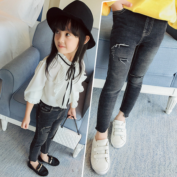 Stílusos gyermekfarmer lányoknak, magas derékkal, fekete foltokkal