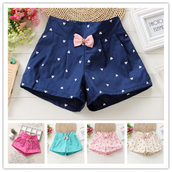 Нежни детски къси панталони за момичета с декоративна мини панделка на сърца и на точки в много и разични цветове,два модела