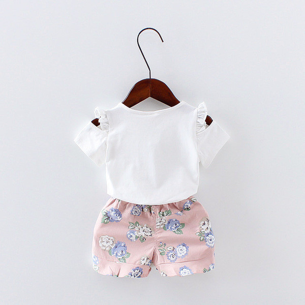 Set pentru copii modern pentru fete din două părți - tricou cu aplicație și inscripție și pantaloni cu motiv floral în două culori