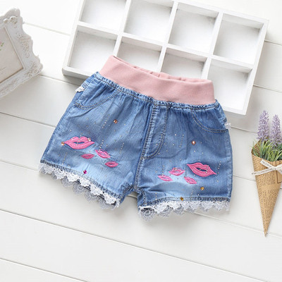 Children`s short jeans for girls with decorative beads, embroidery and print
