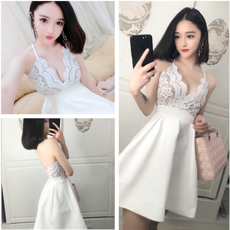 Стилна дамска рокля с V-образно деколте разкроена в бял цвят