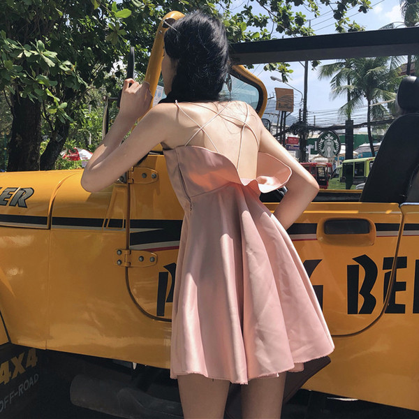 Дамска рокля разкроена с гол гръб с кръстосани връзки в розов цвят