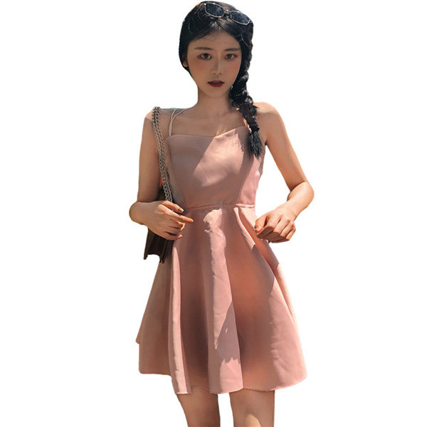 Дамска рокля разкроена с гол гръб с кръстосани връзки в розов цвят