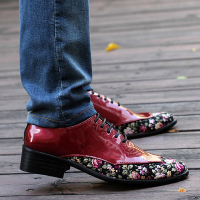 Modern men`s formal shoes with floral motifs in several colors