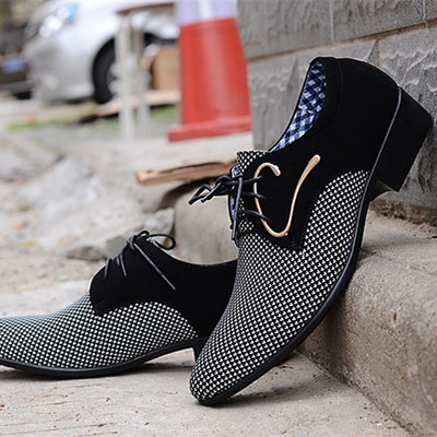 Men`s elegant shoes made of fabric with metal elements