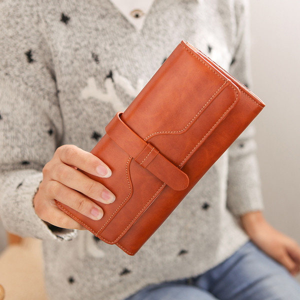 Portofel lung de dama din piele ecologica in diferite culori cu decor metalic si inscriptionare