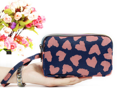 Νέο μοντέλο γυναικείο πορτοφόλι με φερμουάρ σε διαφορετική εκτύπωση