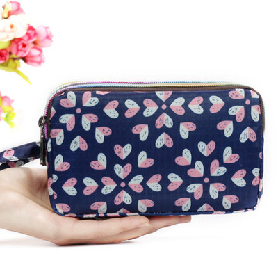 Νέο μοντέλο γυναικείο πορτοφόλι με φερμουάρ σε διαφορετική εκτύπωση