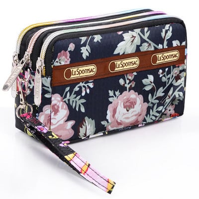 New model women`s wallet with a zipper in a different print