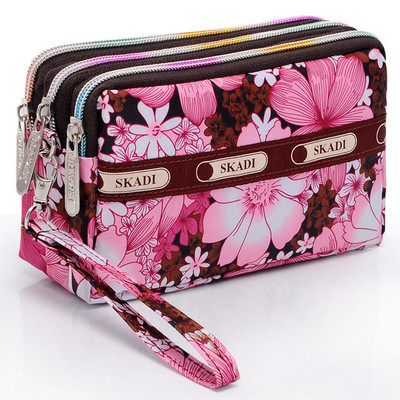 Νέο μοντέλο γυναικείο πορτοφόλι με φερμουάρ σε διαφορετική εκτύπωση