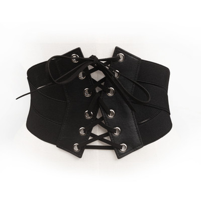 Women`s elastic belt with cross ties and back zipper