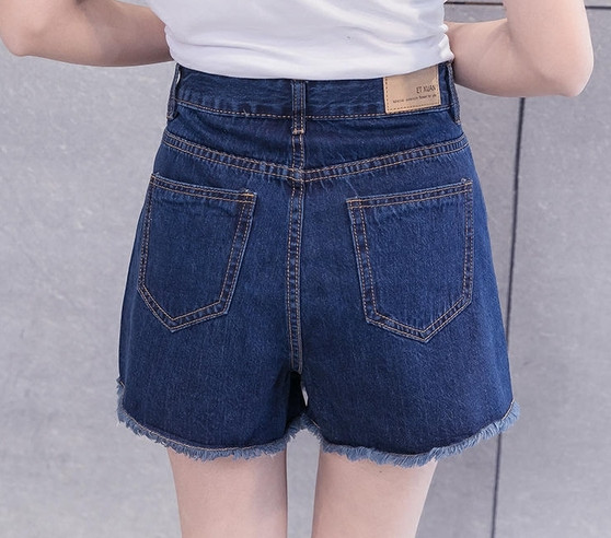 Fusta blugi de dama scurta cu talie inalta, decorata cu imprimeuri mici