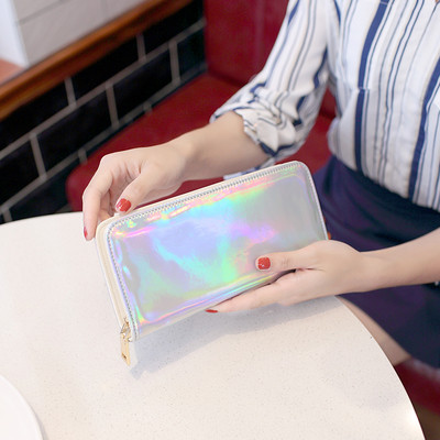 Women`s wallet in different colors with holographic effect