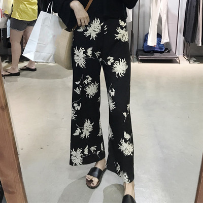 Pantaloni eleganti de dama cu talie inalta cu motiv floral in negru