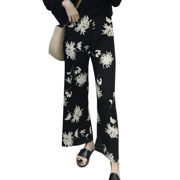 Pantaloni eleganti de dama cu talie inalta cu motiv floral in negru