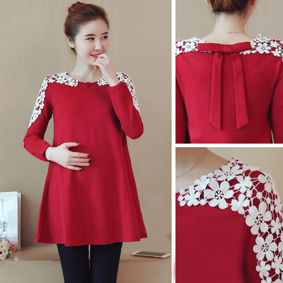 Women`s tunic for pregnant women in two colors with embroidery in floral motifs
