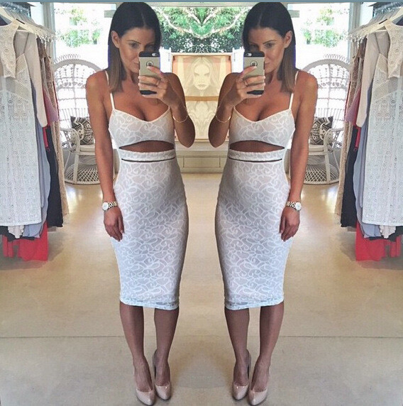 Κομψό γυναικείο φόρεμα σε λευκό και μαύρο με λεπτές λουρίδες