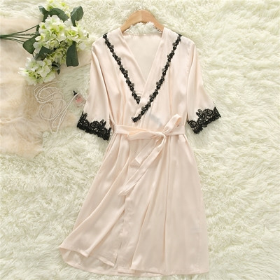 Women`s satin bathrobe with lace decoration in two models - short and long sleeves