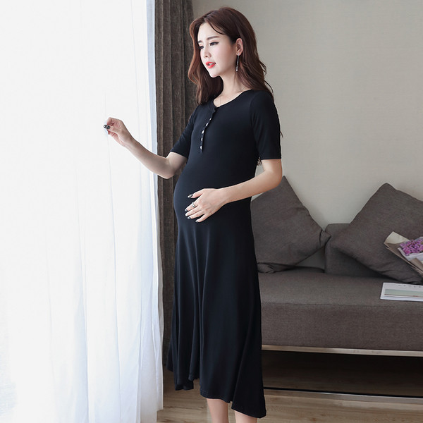 Rochie de dama cu maneci scurte, decolteu O cu nasturi de culoare neagra