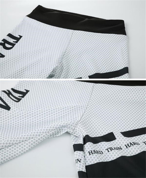 Jambiere sport de damă în gri cu elemente negre și inscripție