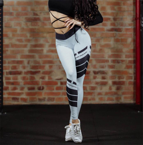 Jambiere sport de damă în gri cu elemente negre și inscripție