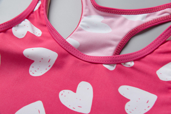 Costum de baie pentru fete pentru copii din două părți - maiou și chiloți roz cu imprimeu