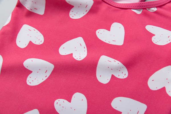 Costum de baie pentru fete pentru copii din două părți - maiou și chiloți roz cu imprimeu