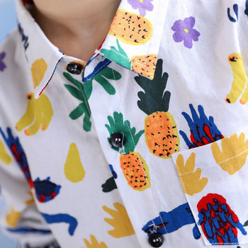 Детска спротно-ежедневна риза с V-образна яка и цветни апликации в бял и черен цвят