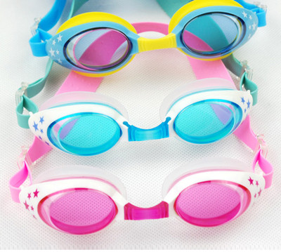 Children`s swimming goggles in different colors