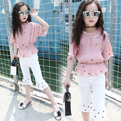 Modern children`s set for girls in two parts - blouse + pants with decorative pearls in white and pink