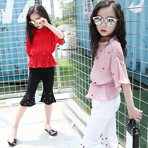 Set pentru copii modern pentru fete în două părți - bluză + pantaloni cu perle decorative în alb și roz