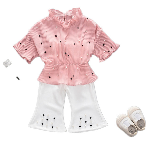 Set pentru copii modern pentru fete în două părți - bluză + pantaloni cu perle decorative în alb și roz