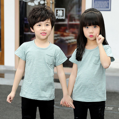 Детска тениска в няколко цвята с декоративен джоб подходяща за момичета и момчета