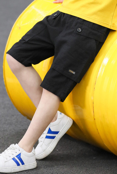 Pantaloni sport-eleganti pentru un baiat cu buzunare laterale mari in mai multe culori