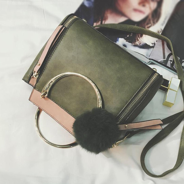 Geanta dama sport-eleganta cu maner metalic si lung, cu fermoare