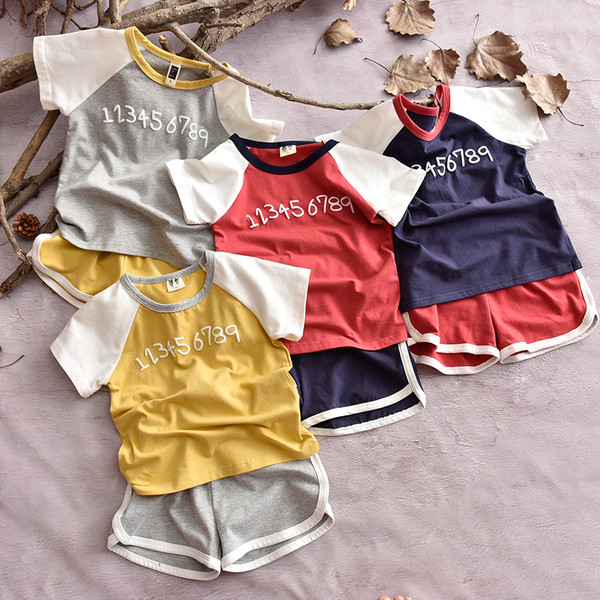 Echipa sportivă pentru copii pentru fete și băieți în două părți - tricou + pantaloni scurți cu margini colorate în multe culori diferite