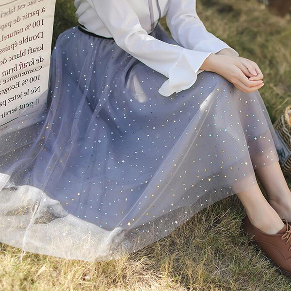 Κομψή γυναικεία φούστα σε τρία χρώματα με λαμπερά στοιχεία, μήκος κάτω από τα γόνατα