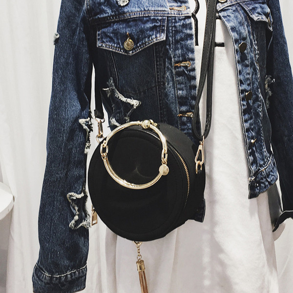 Mini 1anta de dama simplu in forma rotunda cu bretele duble