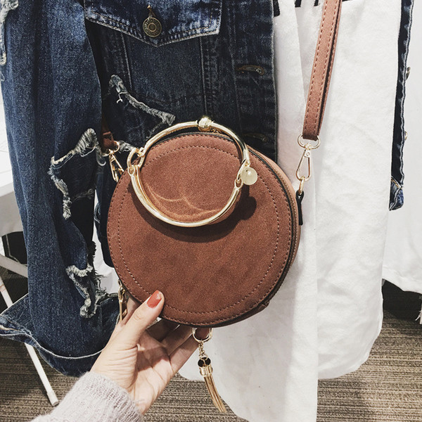 Mini 1anta de dama simplu in forma rotunda cu bretele duble