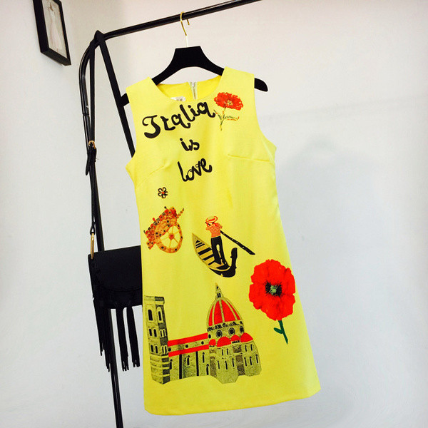 Γυναικείο  φόρεμα σε κίτρινο χρώμα με επιγραφές